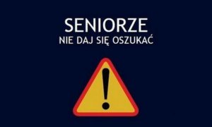 znak drogowy ostrzegawczy z wykrzyknikiem oraz napis na granatowym tle &quot;Seniorze nie daj się oszukać&quot;