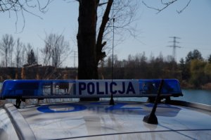 napis Policja na radiowozie